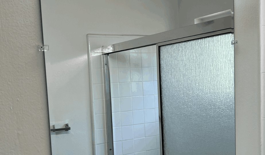 Finished bathroom enclosure documented after service